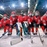 Youth hockey team - children play ice hockey